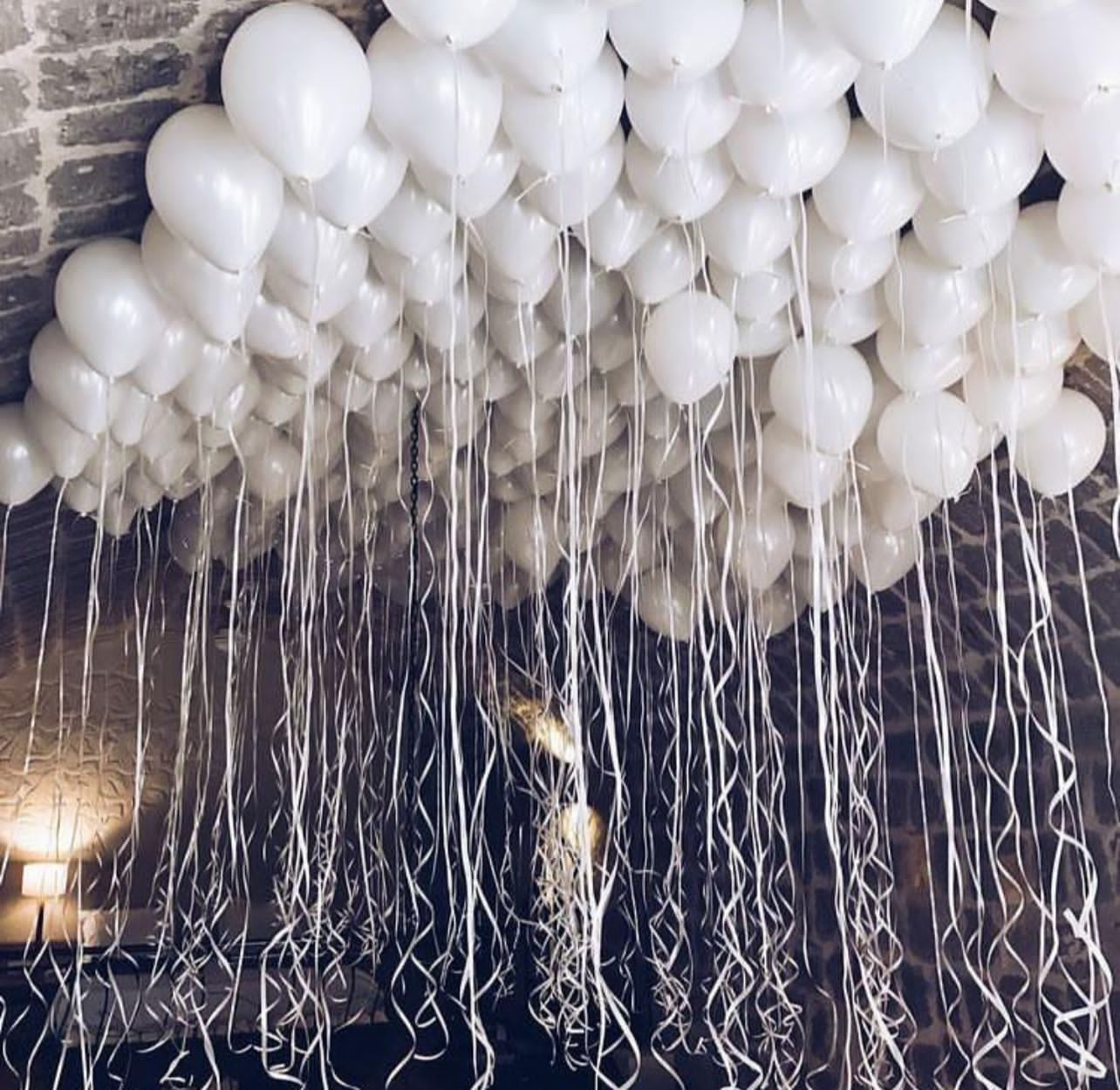 White ceiling balloons