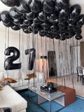 Black balloons setup