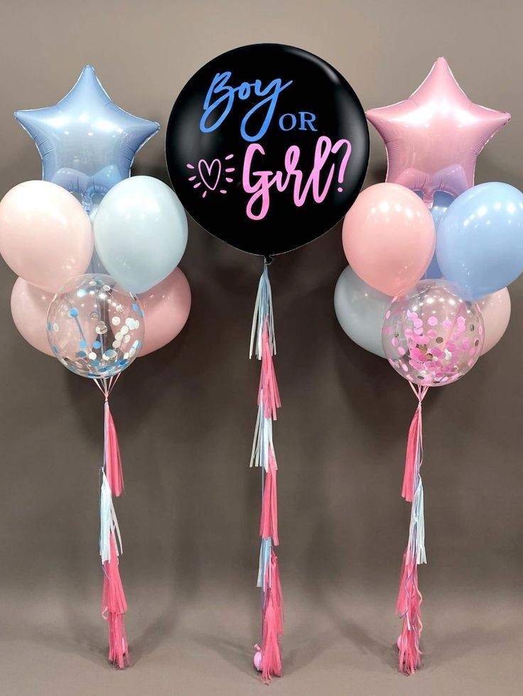 Gender reveal balloon with pink and blue star