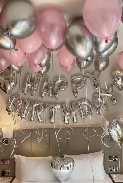 Pink and silver Surprise balloons setup